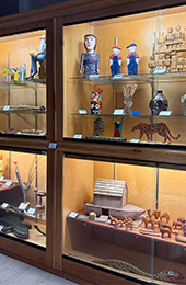 Self taught artists pieces on shelves